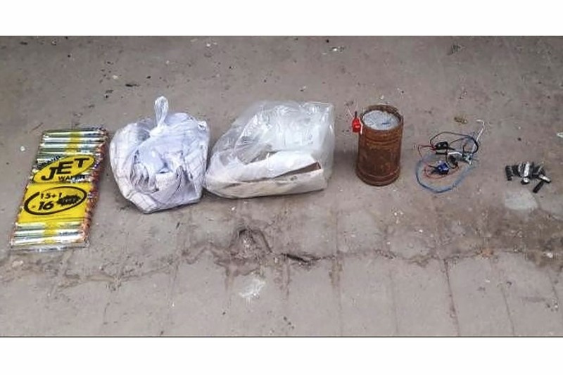 In this photo provided by the Military True News Information Team, a parcel-reception location at the entrance of the Insein prison sits damaged after an explosion Wednesday, Oct. 19, 2022, in Yangon, Myanmar. A bombing on Wednesday near the front gate of Myanmar’s main prison for political detainees killed a number people, including visitors and prison personnel, local media and the government said. (Military True News Information Team via AP)