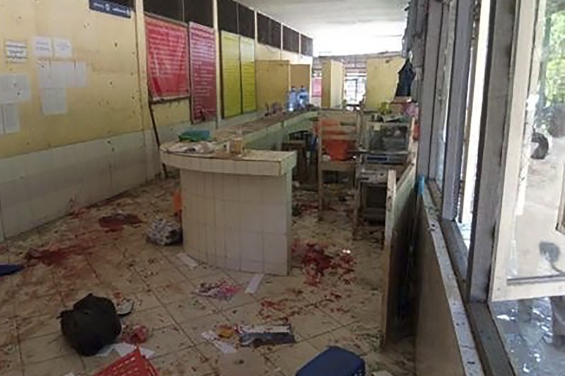 Myanmar Prison Bombing In this photo provided by the Military True News Information Team, a parcel-reception location at the entrance of the Insein prison sits damaged after an explosion Wednesday, Oct. 19, 2022, in Yangon, Myanmar. A bombing on Wednesday near the front gate of Myanmar’s main prison for political detainees killed a number people, including visitors and prison personnel, local media and the government said. (Military True News Information Team via AP)