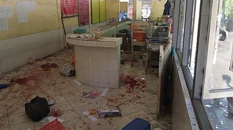 In this photo provided by the Military True News Information Team, a parcel-reception location at the entrance of the Insein prison sits damaged after an explosion Wednesday, Oct. 19, 2022, in Yangon, Myanmar. A bombing on Wednesday near the front gate of Myanmar’s main prison for political detainees killed a number people, including visitors and prison personnel, local media and the government said. (Military True News Information Team via AP)