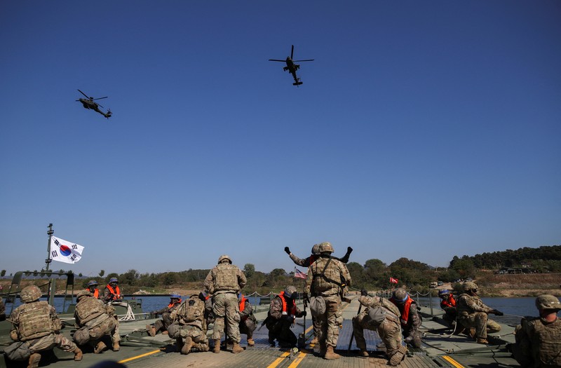 A South Korean tank takes part in a joint river crossing operation drill between South Korean and U.S. troops, in Yeoju, South Korea, October 19, 2022. REUTERS/Kim Hong-Ji