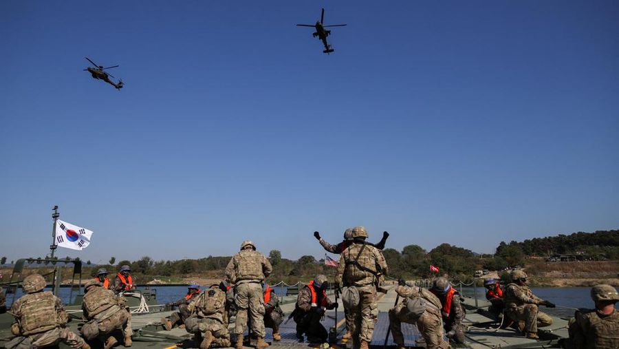 A South Korean tank takes part in a joint river crossing operation drill between South Korean and U.S. troops, in Yeoju, South Korea, October 19, 2022. REUTERS/Kim Hong-Ji