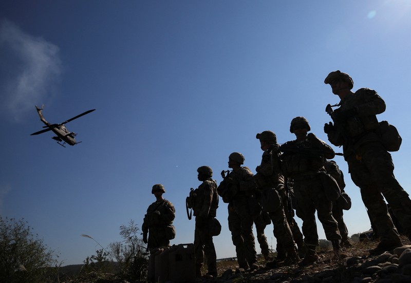 A South Korean tank takes part in a joint river crossing operation drill between South Korean and U.S. troops, in Yeoju, South Korea, October 19, 2022. REUTERS/Kim Hong-Ji