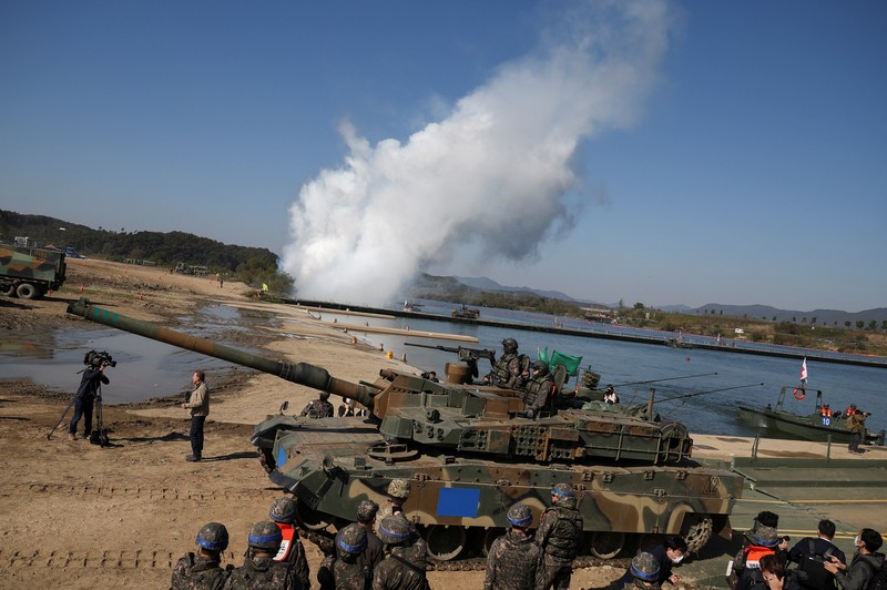 A South Korean tank takes part in a joint river crossing operation drill between South Korean and U.S. troops, in Yeoju, South Korea, October 19, 2022. REUTERS/Kim Hong-Ji