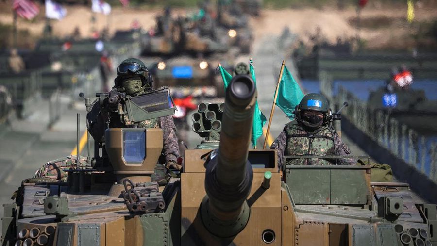 A South Korean tank takes part in a joint river crossing operation drill between South Korean and U.S. troops, in Yeoju, South Korea, October 19, 2022. REUTERS/Kim Hong-Ji
