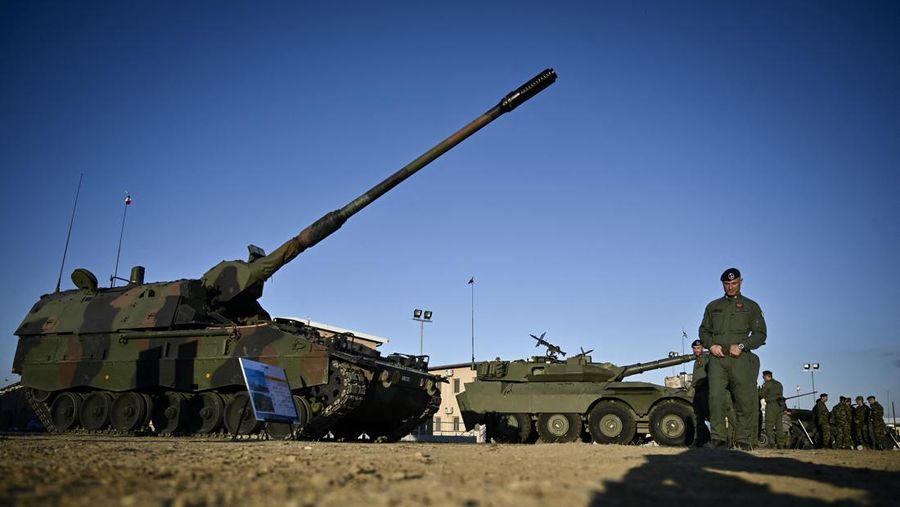 Italian soldiers stand in formation as they take part in the official ceremony marking Italy's becoming a framework nation for the NATO battle group on the territory of Bulgaria at Novo Selo military ground on October 17, 2022. (Photo by Nikolay DOYCHINOV / AFP) (Photo by NIKOLAY DOYCHINOV/AFP via Getty Images)