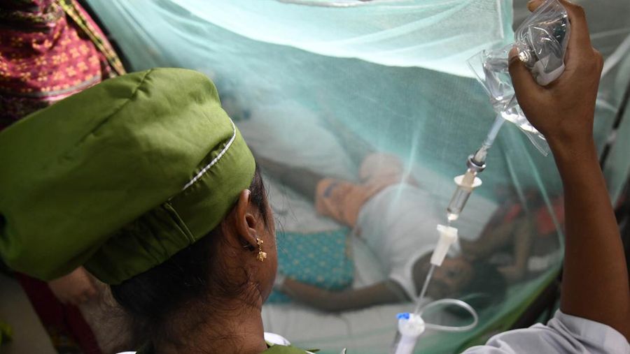 Children are kept inside mosquito nets as they are hospitalized due to dengue fever at Dhaka Child Hospital in Dhaka, Bangladesh on October 19, 2022.  Bangladesh logged its highest daily caseload of dengue fever on Tuesday, with 900 cases reported over the past 24 hours, raising the total tally to 26,938 in the country this year, according to the Media Report. (Photo by Syed Mahamudur Rahman/NurPhoto via Getty Images)