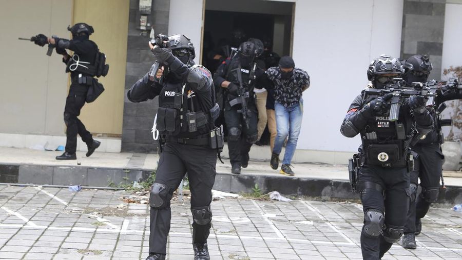 Special force members take part in an anti-terror security drill as part of preparations for the summit meeting of the G20 in Bali, Indonesia on Thursday, Oct. 20, 2022. (AP Photo/Firdia Lisnawati)