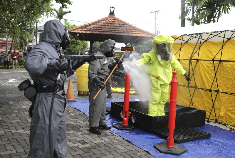 Special force members take part in an anti-terror security drill as part of preparations for the summit meeting of the G20 in Bali, Indonesia on Thursday, Oct. 20, 2022. (AP Photo/Firdia Lisnawati)
