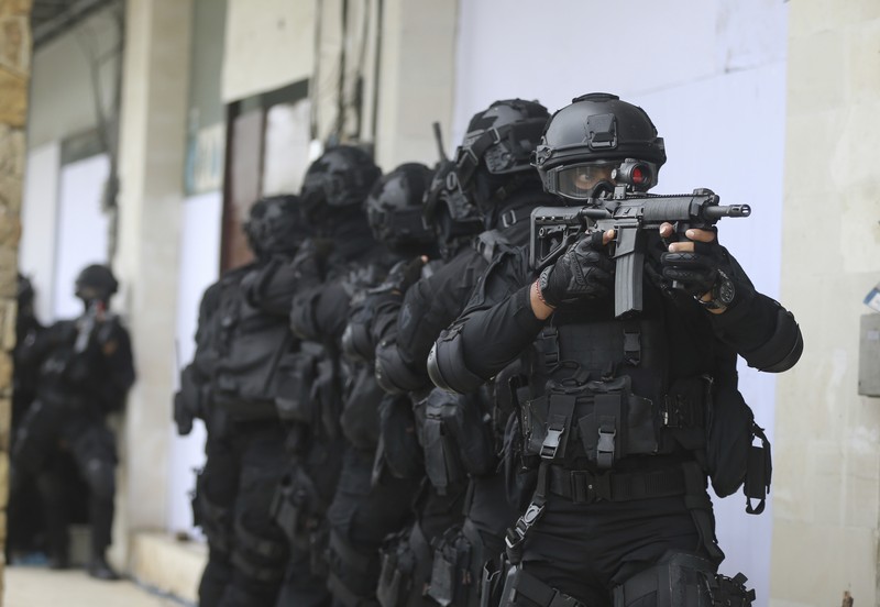 Special force members take part in an anti-terror security drill as part of preparations for the summit meeting of the G20 in Bali, Indonesia on Thursday, Oct. 20, 2022. (AP Photo/Firdia Lisnawati)