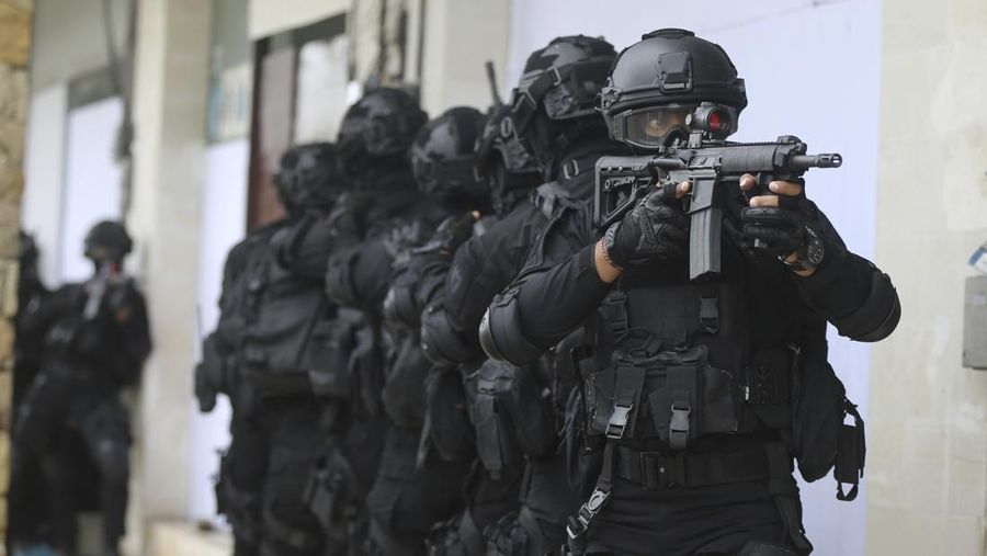 Special force members take part in an anti-terror security drill as part of preparations for the summit meeting of the G20 in Bali, Indonesia on Thursday, Oct. 20, 2022. (AP Photo/Firdia Lisnawati)