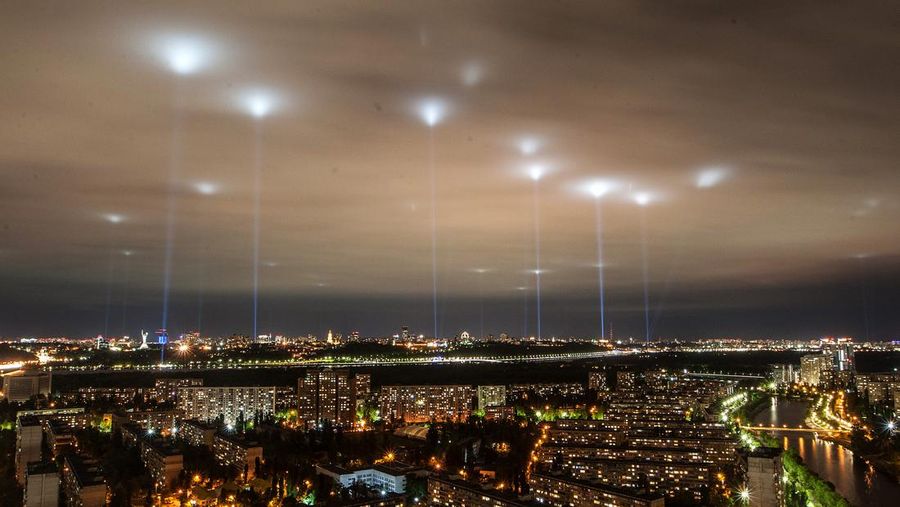 KYIV, UKRAINE - MAY 13, 2020 - Floodlights set at landmark sites illuminate the sky over Kyiv during the Stop Cultural Quarantine action organized to draw the attention of the government and the society to supporting creative and entertainment industries affected by coronavirus lockdown, Kyiv, capital of Ukraine. - PHOTOGRAPH BY Ukrinform / Future Publishing (Photo credit should read Evgen Kotenko/ Ukrinform/Future Publishing via Getty Images)