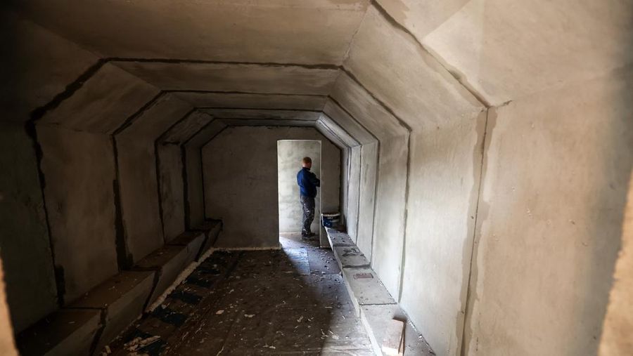 KHARKIV, UKRAINE - OCTOBER 19, 2022 - A concrete bomb shelter set next to one of the bus stops, Kharkiv, norheastern Ukraine. (Photo credit should read Vyacheslav Madiyevskyi / Ukrinform/Future Publishing via Getty Images)