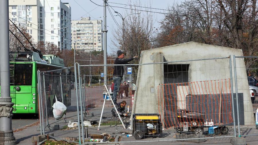 KHARKIV, UKRAINE - OCTOBER 19, 2022 - Men are seen during the production of the components for a concrete bomb shelter, Kharkiv, norheastern Ukraine. (Photo credit should read Vyacheslav Madiyevskyi / Ukrinform/Future Publishing via Getty Images)