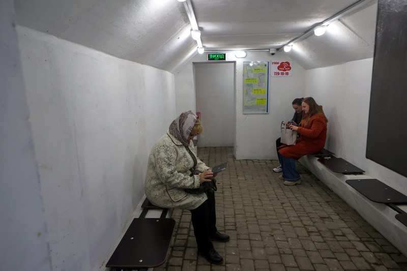1244096129 KHARKIV, UKRAINE - OCTOBER 19, 2022 - Men are seen during the production of the components for a concrete bomb shelter, Kharkiv, norheastern Ukraine. (Photo credit should read Vyacheslav Madiyevskyi / Ukrinform/Future Publishing via Getty Images)