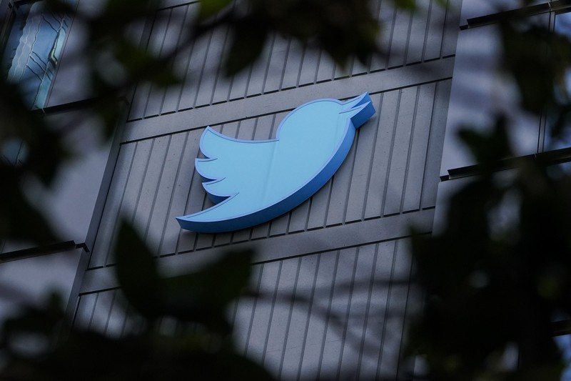 This image from the Twitter page of Elon Musk shows Musk entering Twitter headquarters carrying a sink through the lobby area on Wednesday, Oct. 26, 2022 in San Francisco.  Musk posted a video Wednesday showing him strolling into Twitter headquarters ahead of a Friday deadline to close his $44 billion deal to buy the company.  (Twitter page of Elon Musk via AP)