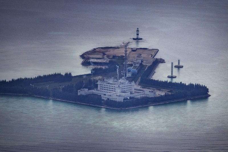 SPRATLY ISLANDS, AT SEA - OCTOBER 25: An airfield, buildings, and structures are seen on the artificial island built by China in Subi Reef on October 25, 2022 in Spratly Islands, South China Sea. China has progressively asserted its claim of ownership over disputed islands in the South China Sea by artificially increasing the size of islands, creating new islands and building ports, military outposts and airstrips. The South China sea is an important trade route and is of significant interest as geopolitical tensions remain high in the region. (Photo by Ezra Acayan/Getty Images)