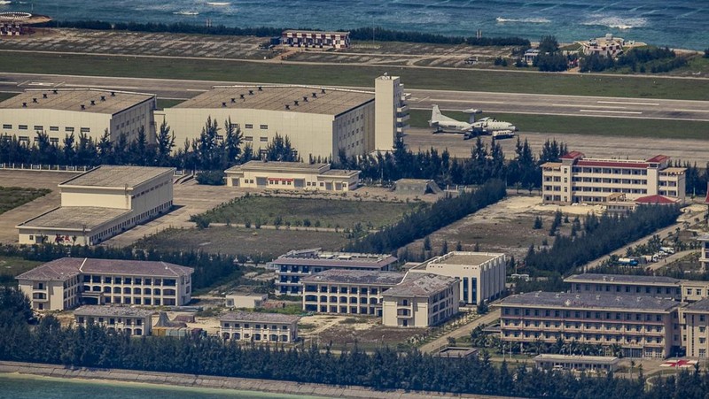 SPRATLY ISLANDS, AT SEA - OCTOBER 25: Buildings and structures are seen on the artificial island built by China in Gaven Reefs on October 25, 2022 in Spratly Islands, South China Sea. China has progressively asserted its claim of ownership over disputed islands in the South China Sea by artificially increasing the size of islands, creating new islands and building ports, military outposts and airstrips. The South China sea is an important trade route and is of significant interest as geopolitical tensions remain high in the region. (Photo by Ezra Acayan/Getty Images)