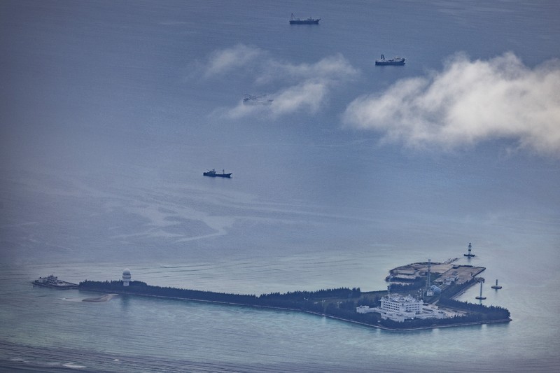 SPRATLY ISLANDS, AT SEA - OCTOBER 25: Buildings and structures are seen on the artificial island built by China in Gaven Reefs on October 25, 2022 in Spratly Islands, South China Sea. China has progressively asserted its claim of ownership over disputed islands in the South China Sea by artificially increasing the size of islands, creating new islands and building ports, military outposts and airstrips. The South China sea is an important trade route and is of significant interest as geopolitical tensions remain high in the region. (Photo by Ezra Acayan/Getty Images)