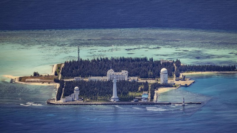 SPRATLY ISLANDS, AT SEA - OCTOBER 25: An airfield, buildings, and structures are seen on the artificial island built by China in Subi Reef on October 25, 2022 in Spratly Islands, South China Sea. China has progressively asserted its claim of ownership over disputed islands in the South China Sea by artificially increasing the size of islands, creating new islands and building ports, military outposts and airstrips. The South China sea is an important trade route and is of significant interest as geopolitical tensions remain high in the region. (Photo by Ezra Acayan/Getty Images)