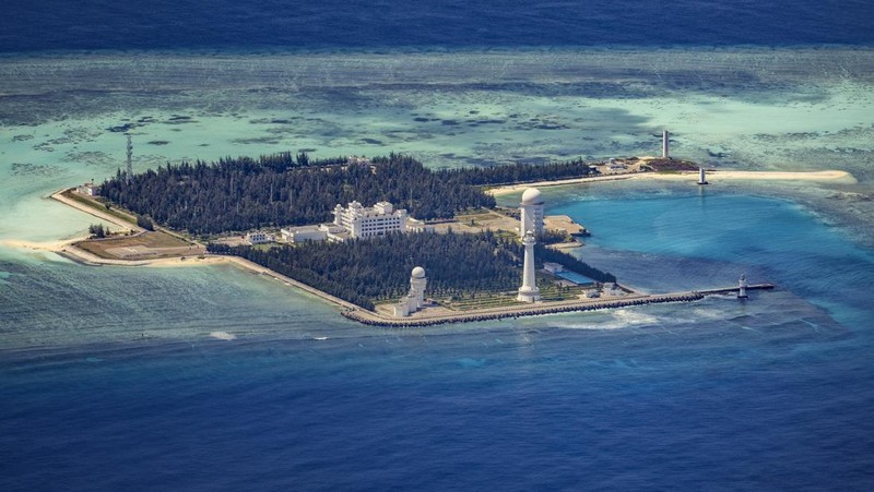 SPRATLY ISLANDS, AT SEA - OCTOBER 25: Buildings and structures are seen on the artificial island built by China in Gaven Reefs on October 25, 2022 in Spratly Islands, South China Sea. China has progressively asserted its claim of ownership over disputed islands in the South China Sea by artificially increasing the size of islands, creating new islands and building ports, military outposts and airstrips. The South China sea is an important trade route and is of significant interest as geopolitical tensions remain high in the region. (Photo by Ezra Acayan/Getty Images)