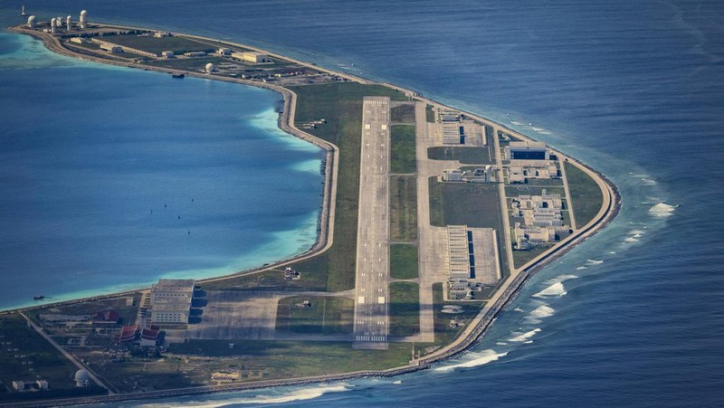SPRATLY ISLANDS, AT SEA - OCTOBER 25: An airfield, buildings, and structures are seen on the artificial island built by China in Subi Reef on October 25, 2022 in Spratly Islands, South China Sea. China has progressively asserted its claim of ownership over disputed islands in the South China Sea by artificially increasing the size of islands, creating new islands and building ports, military outposts and airstrips. The South China sea is an important trade route and is of significant interest as geopolitical tensions remain high in the region. (Photo by Ezra Acayan/Getty Images)