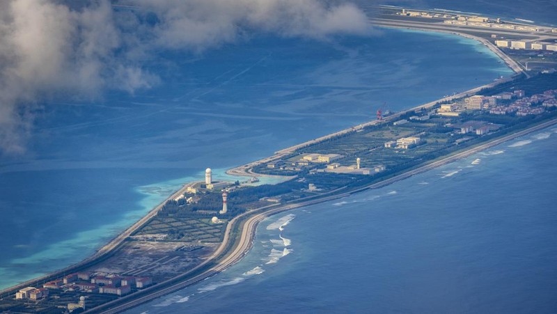 SPRATLY ISLANDS, AT SEA - OCTOBER 25: Buildings and structures are seen on the artificial island built by China in Gaven Reefs on October 25, 2022 in Spratly Islands, South China Sea. China has progressively asserted its claim of ownership over disputed islands in the South China Sea by artificially increasing the size of islands, creating new islands and building ports, military outposts and airstrips. The South China sea is an important trade route and is of significant interest as geopolitical tensions remain high in the region. (Photo by Ezra Acayan/Getty Images)