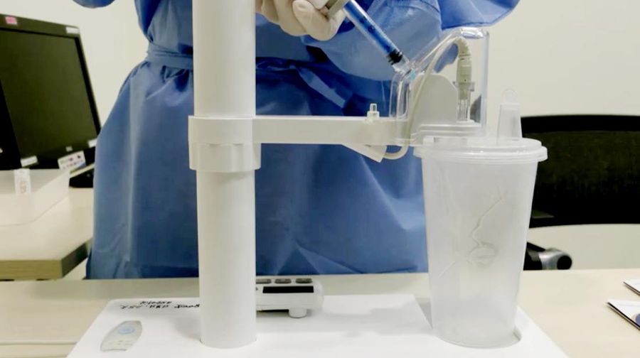 Vaksin COVID aerosol yang dikembangkan oleh perusahaan biofarmasi China CanSino Biologics Inc.(Shanghai Media Group via AP)