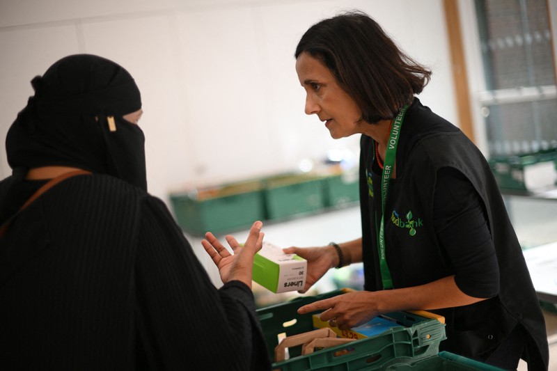ROMFORD, ENGLAND - OCTOBER 27: A food bank collection is advertised in the window of a Halifax building society branch on South Street  on October 27, 2022 in Romford, England. (File. John Keeble/Getty Images)