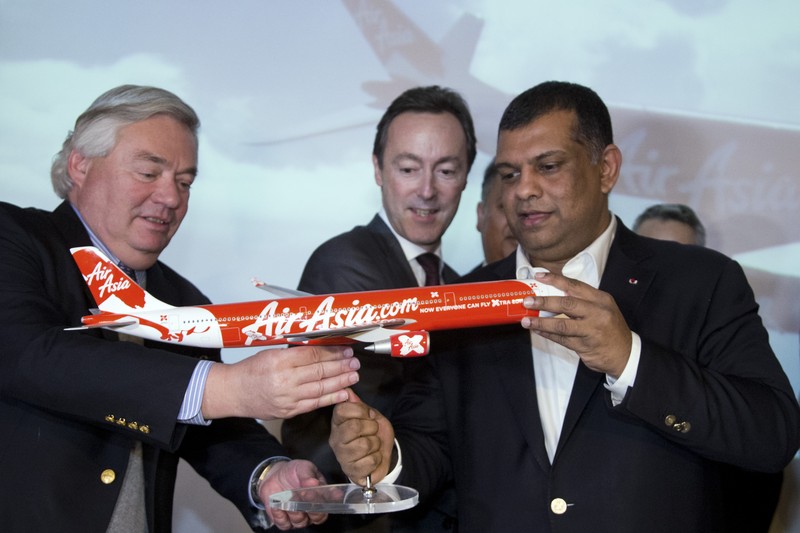 CEO Grup AirAsia, Tony Fernandes berbicara pada konferensi pers di Sydney pada 12 Maret 2015. (AFP/PETER PARKS) CEO Grup AirAsia, Tony Fernandes berbicara pada konferensi pers di Sydney pada 12 Maret 2015. (AFP/PETER PARKS)