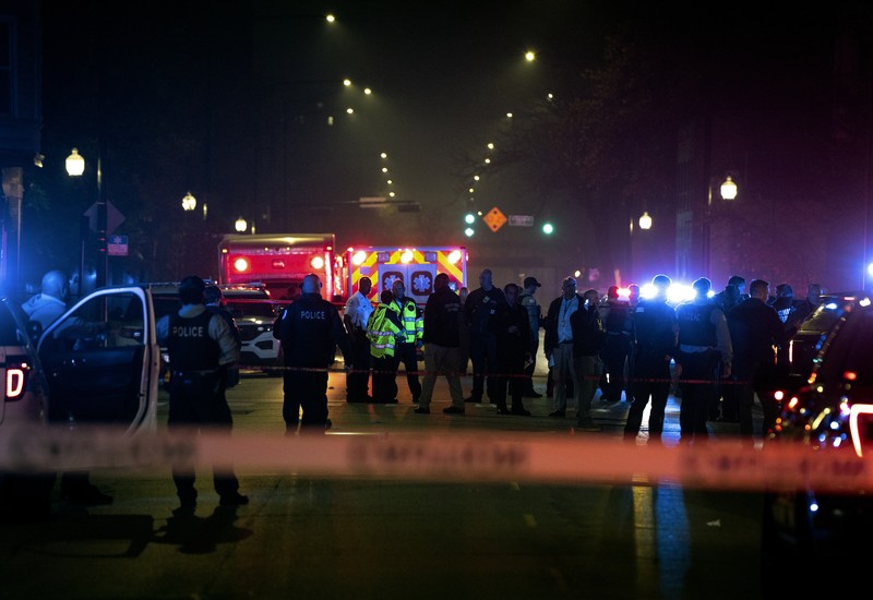 Halloween-Shootings Chicago Chicago police and emergency medical responders work at the scene of a mass shooting near Polk Street and California Avenue on the city's West Side on Monday, Oct. 31, 2022. Chicago Police say several people were injured in a drive-by shooting Halloween night, including three children (E. Jason Wambsgans /Chicago Tribune via AP)