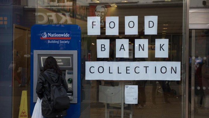 ROMFORD, ENGLAND - OCTOBER 27: A food bank collection is advertised in the window of a Halifax building society branch on South Street  on October 27, 2022 in Romford, England. (File. John Keeble/Getty Images)
