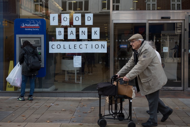ROMFORD, ENGLAND - OCTOBER 27: A food bank collection is advertised in the window of a Halifax building society branch on South Street  on October 27, 2022 in Romford, England. (File. John Keeble/Getty Images)