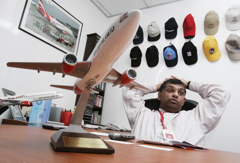 CEO Grup AirAsia, Tony Fernandes berbicara pada konferensi pers di Sydney pada 12 Maret 2015. (AFP/PETER PARKS) CEO Grup AirAsia, Tony Fernandes berbicara pada konferensi pers di Sydney pada 12 Maret 2015. (AFP/PETER PARKS)