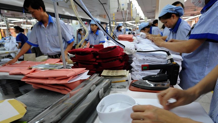 Ilustrasi pabrik garmen (AFP via Getty Images)