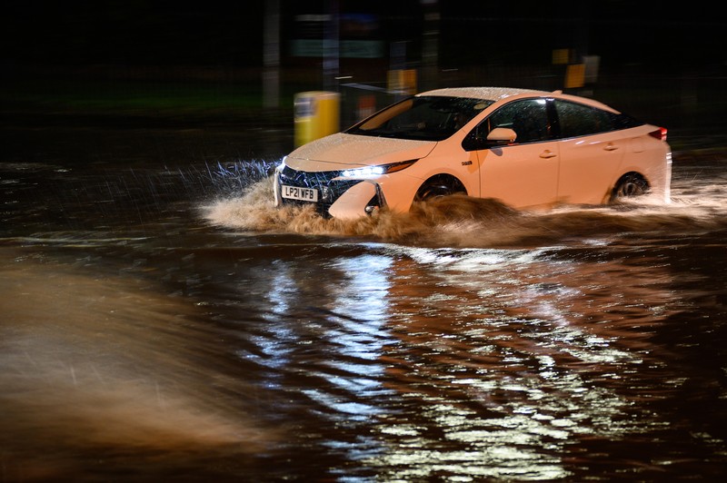 London, England. Torrential rain and flash flooding LONDON, ENGLAND - NOVEMBER 02: Vehicles negotiate a flooded section of the A1 road on November 02, 2022 in London, England. Torrential rain and flash flooding hit the region late on Wednesday evening, causing traffic jams as cars became stuck in the standing water. (Leon Neal/Getty Images)