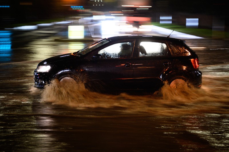 London, England. Torrential rain and flash flooding LONDON, ENGLAND - NOVEMBER 02: Vehicles negotiate a flooded section of the A1 road on November 02, 2022 in London, England. Torrential rain and flash flooding hit the region late on Wednesday evening, causing traffic jams as cars became stuck in the standing water. (Leon Neal/Getty Images)