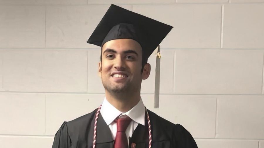 Prince Abdullah bin Faisal al Saud wears cap and gown for his undergraduate graduation from Northeastern University in Boston, in 2018. Tough prison sentences that Saudi Arabia has handed the Saudi student and a Saudi-American citizen suggest Saudi Crown Prince Mohammed bin Salman is maintaining or escalating a crackdown on Saudi dissidents in the West, Saudi exiles and rights groups say. The Saudi prince who was attending graduate school in Boston is the latest person targeted as part of what the FBI and others say is Saudi Arabia's crackdown on Saudis in the United States. (AP Photo)