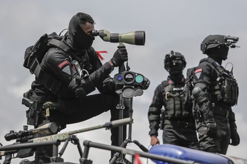 Apel Pengamanan TNI - Polri Jelang KTT G20 di Nusa Dua Bali TNI mengikuti apel persiapan pengamanan KTT G20 mendatang di Denpasar, Bali, ,Senin (7/11/2022). Sebanyak 18.030 tim gabungan dari TNI-POlri akan mengamankan Konferensi Tingkat Tinggi (KTT) G20 Head of State and Government Summit pada 15-16 November 2022 mendatang di Nusa Dua, Bali. (Photo by Johannes P. Christo/Anadolu Agency via Getty Images)