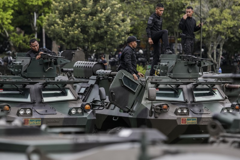 Apel Pengamanan TNI - Polri Jelang KTT G20 di Nusa Dua Bali TNI mengikuti apel persiapan pengamanan KTT G20 mendatang di Denpasar, Bali, ,Senin (7/11/2022). Sebanyak 18.030 tim gabungan dari TNI-POlri akan mengamankan Konferensi Tingkat Tinggi (KTT) G20 Head of State and Government Summit pada 15-16 November 2022 mendatang di Nusa Dua, Bali. (Photo by Johannes P. Christo/Anadolu Agency via Getty Images)