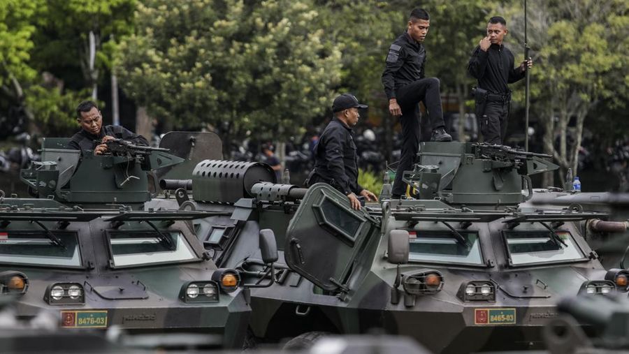 TNI mengikuti apel persiapan pengamanan KTT G20 mendatang di Denpasar, Bali, ,Senin (7/11/2022). Sebanyak 18.030 tim gabungan dari TNI-POlri akan mengamankan Konferensi Tingkat Tinggi (KTT) G20 Head of State and Government Summit pada 15-16 November 2022 mendatang di Nusa Dua, Bali. (Photo by Johannes P. Christo/Anadolu Agency via Getty Images)