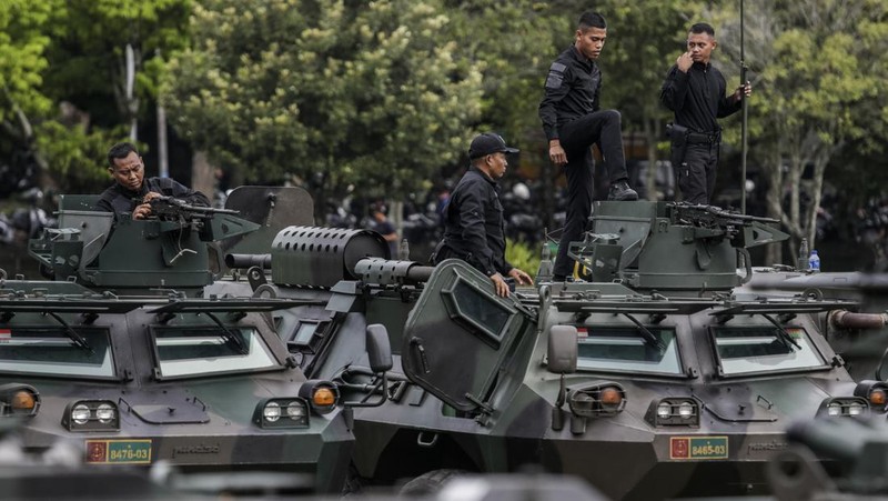 TNI mengikuti apel persiapan pengamanan KTT G20 mendatang di Denpasar, Bali, ,Senin (7/11/2022). Sebanyak 18.030 tim gabungan dari TNI-POlri akan mengamankan Konferensi Tingkat Tinggi (KTT) G20 Head of State and Government Summit pada 15-16 November 2022 mendatang di Nusa Dua, Bali. (Photo by Johannes P. Christo/Anadolu Agency via Getty Images)