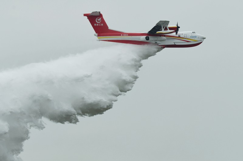 The August 1st Aerobatic Team of the Chinese Air Force performs during the Airshow China in Zhuhai, Guangdong province, China, Nov 8, 2022. (CFOTO/Future Publishing via Getty Images)