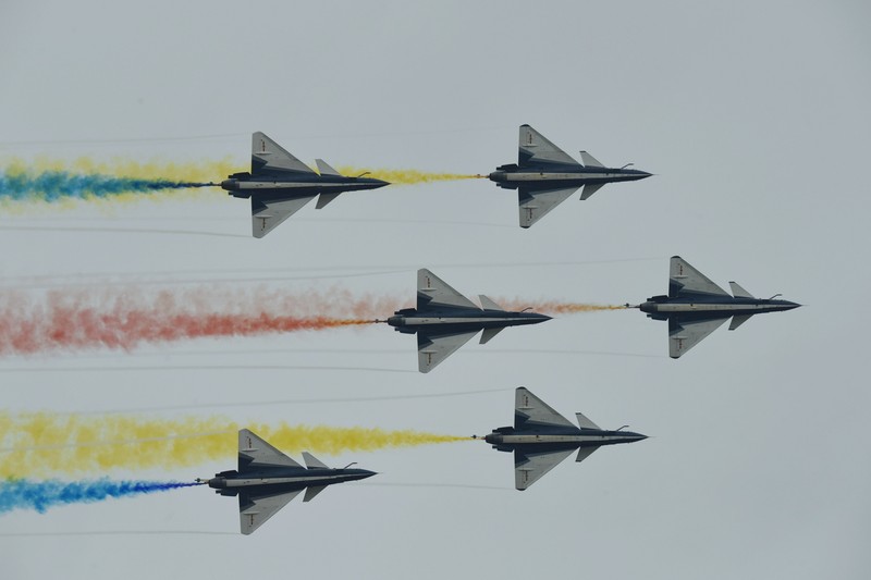 The August 1st Aerobatic Team of the Chinese Air Force performs during the Airshow China in Zhuhai, Guangdong province, China, Nov 8, 2022. (CFOTO/Future Publishing via Getty Images)