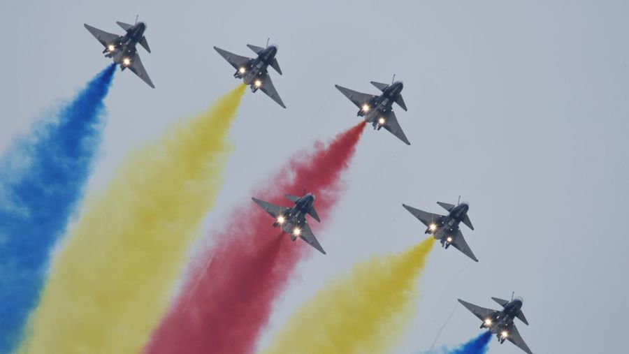 The August 1st Aerobatic Team of the Chinese Air Force performs during the Airshow China in Zhuhai, Guangdong province, China, Nov 8, 2022. (CFOTO/Future Publishing via Getty Images)