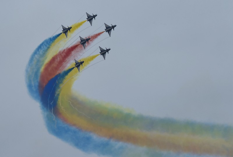 The August 1st Aerobatic Team of the Chinese Air Force performs during the Airshow China in Zhuhai, Guangdong province, China, Nov 8, 2022. (CFOTO/Future Publishing via Getty Images)