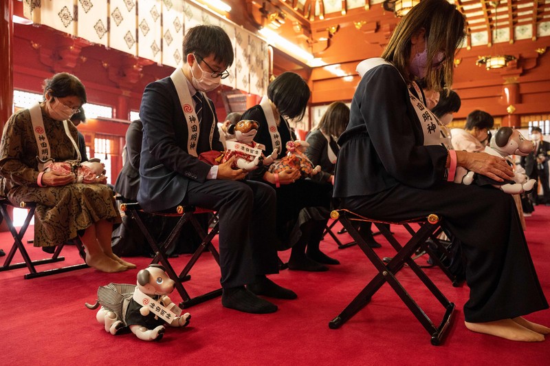 Anjing robot Sony 'Aibo' di ikut sertakan dalam upacara ritual Sichi-Go-San. Owners of Sony's entertainment robot dog