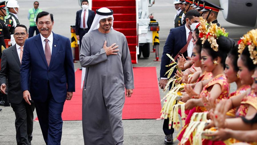 G20-SUMMIT/ARRIVALS Indonesia's Coordinating Minister of Maritime Affairs and Investment Luhut Pandjaitan walks with United Arab Emirates President Sheikh Mohammed bin Zayed Al-Nahyan as he arrives at Ngurah Rai International Airport ahead of the G20 Summit in Bali, Indonesia November 14, 2022. REUTERS/Ajeng Dinar Ulfiana/Pool