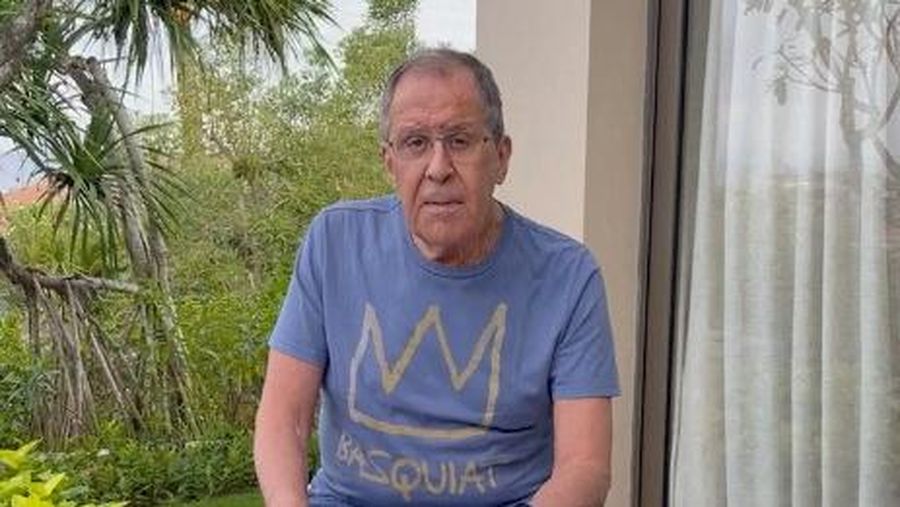Russian Foreign Minister Sergei Lavrov reads documents on a patio in Bali, Indonesia November 14, 2022, in this still image taken from video uploaded on the Telegram channel of Foreign Ministry Spokeswoman Maria Zakharova. Maria Zakharova via Telegram/Handout via REUTERS ATTENTION EDITORS - THIS IMAGE WAS PROVIDED BY A THIRD PARTY. NO RESALES. NO ARCHIVES. MANDATORY CREDIT. MUST CREDIT MARIA ZAKHAROVA VIA TELEGRAM.