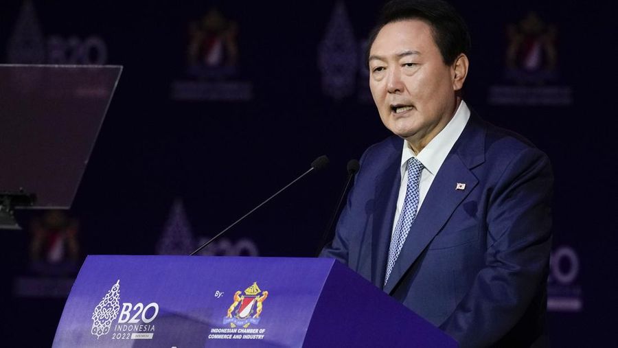 South Korean President Yoon Suk Yeol delivers his speech during the B20 Summit ahead of the G20 leaders summit in Nusa Dua, Bali, Indonesia, Monday, Nov. 14, 2022. (AP Photo/Aaron Favila)