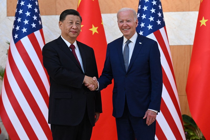 Xi Jinping - Joe Biden US President Joe Biden (L) and China's President Xi Jinping (R) meet on the sidelines of the G20 Summit in Nusa Dua on the Indonesian resort island of Bali on November 14, 2022. (Photo by SAUL LOEB / AFP) (Photo by SAUL LOEB/AFP via Getty Images)